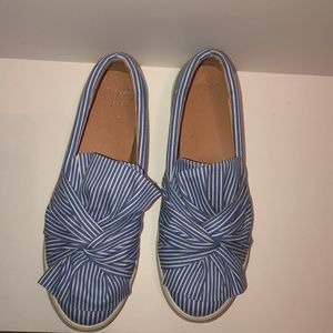 White and blue striped sneakers